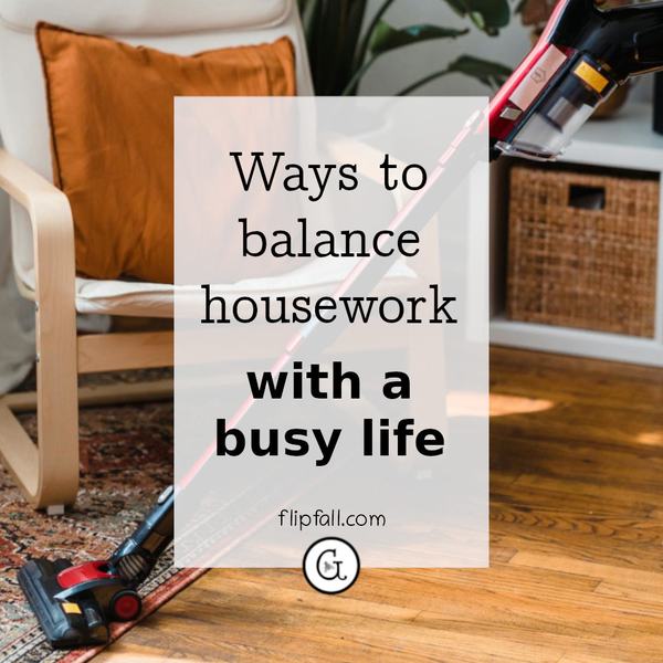 person vacuuming the living room - how to balance household chores with a professional job