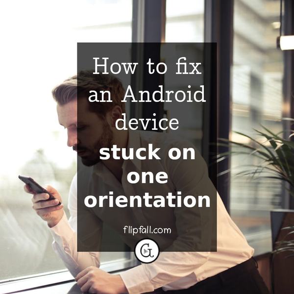 Man holding a phone - how to fix an Android tablet or phone stuck on one orientation