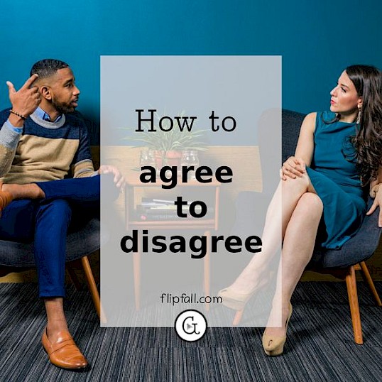 Man and woman sitting on chairs having a discussion