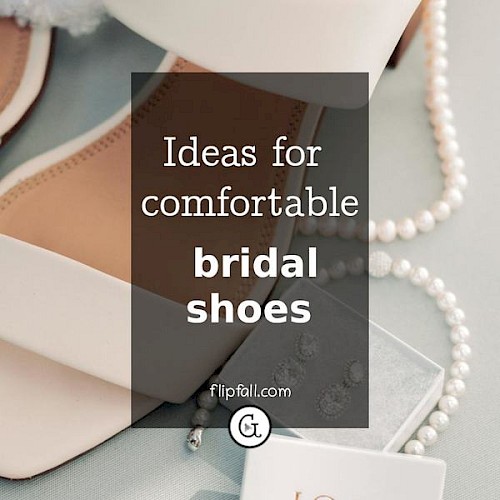 White low heel bridal shoes next to pearl jewelry